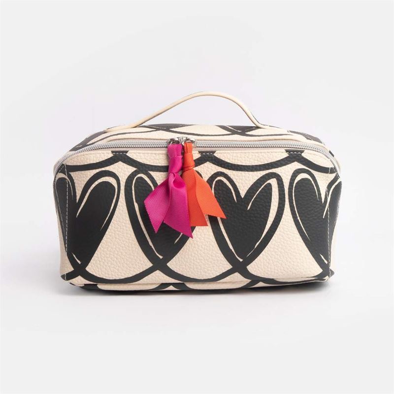 Cosmetic bag with black heart pattern and colorful tassels on a white background