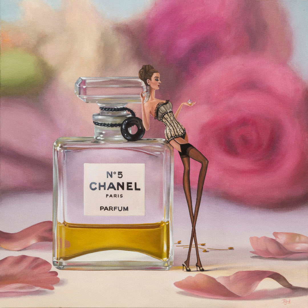 Chanel No. 5 parfum bottle with a stylized illustration of a woman on top, set against a floral background.