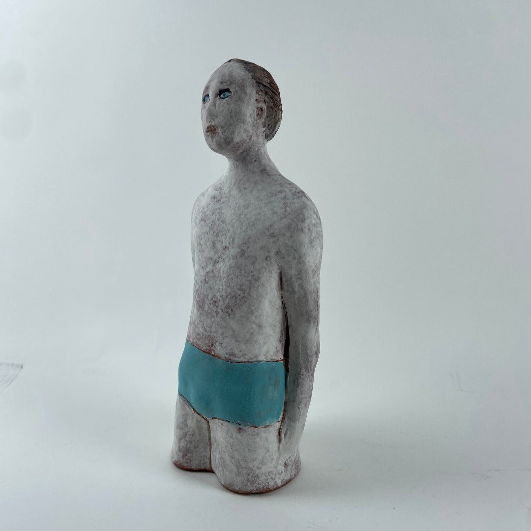 Male Swimmer In Blue Trunks