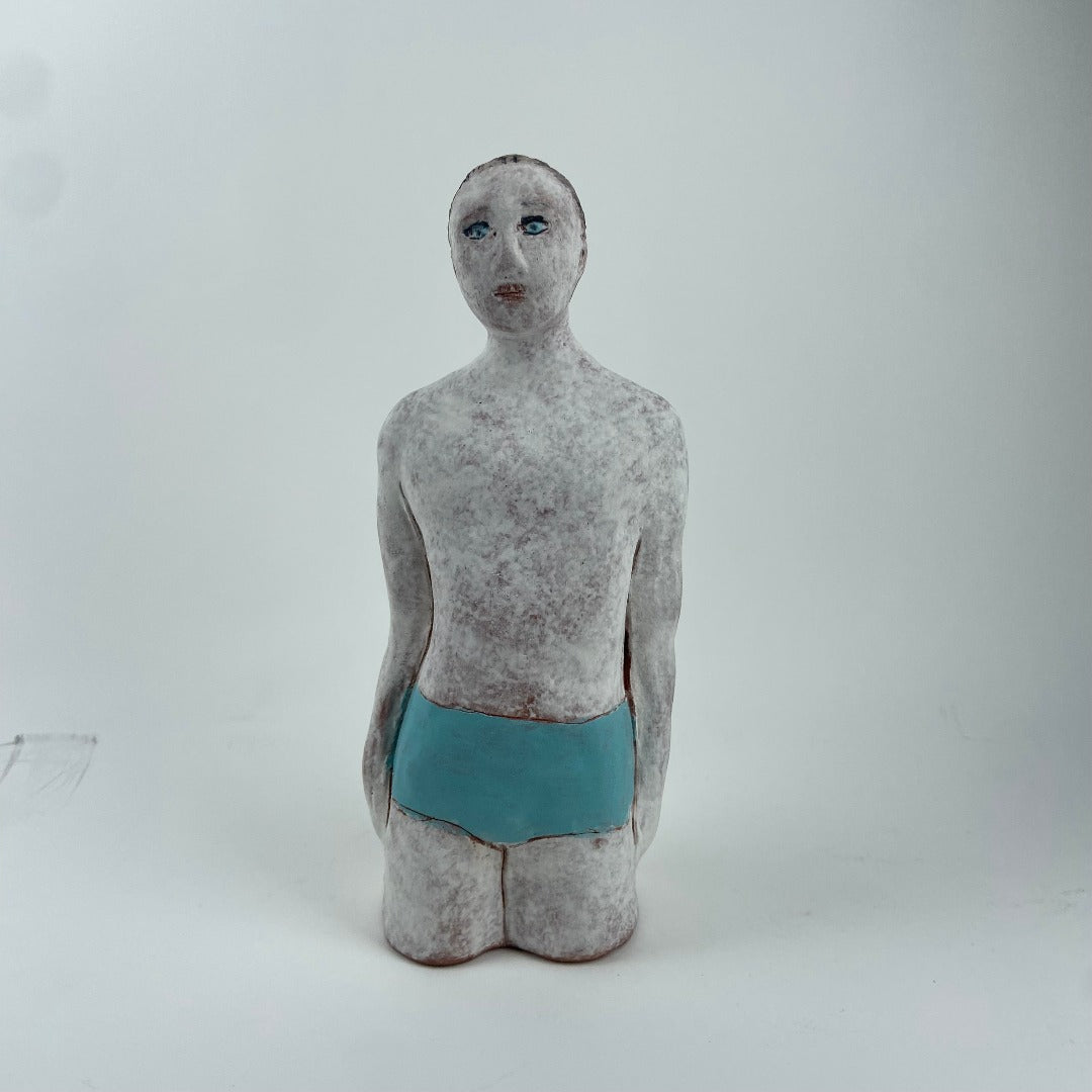 Male Swimmer In Blue Trunks