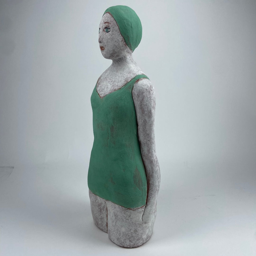 Female Swimmer In Green Cap