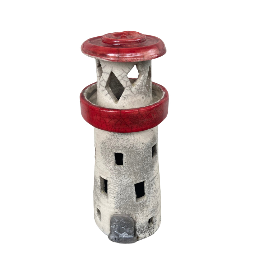 Lighthouse ceramic, raku-fired, red roof. Crafted by Jenny Matthews
