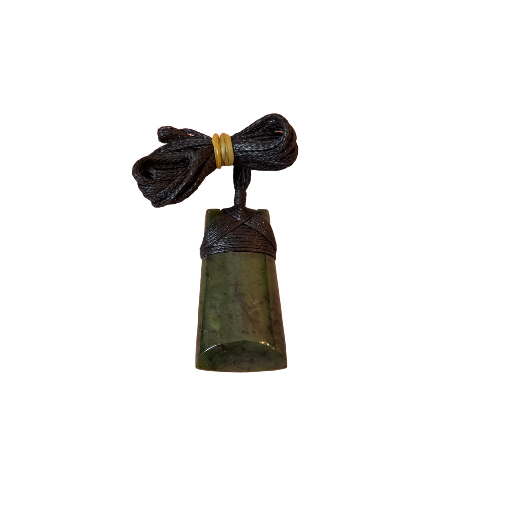 Greenstone pendant with black cord