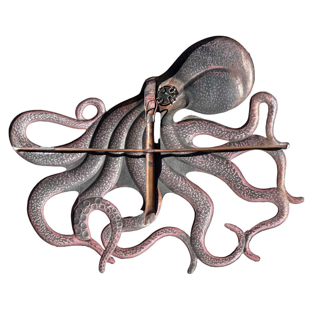 Back view of a hand beaten copper octopus sculpture on a white background