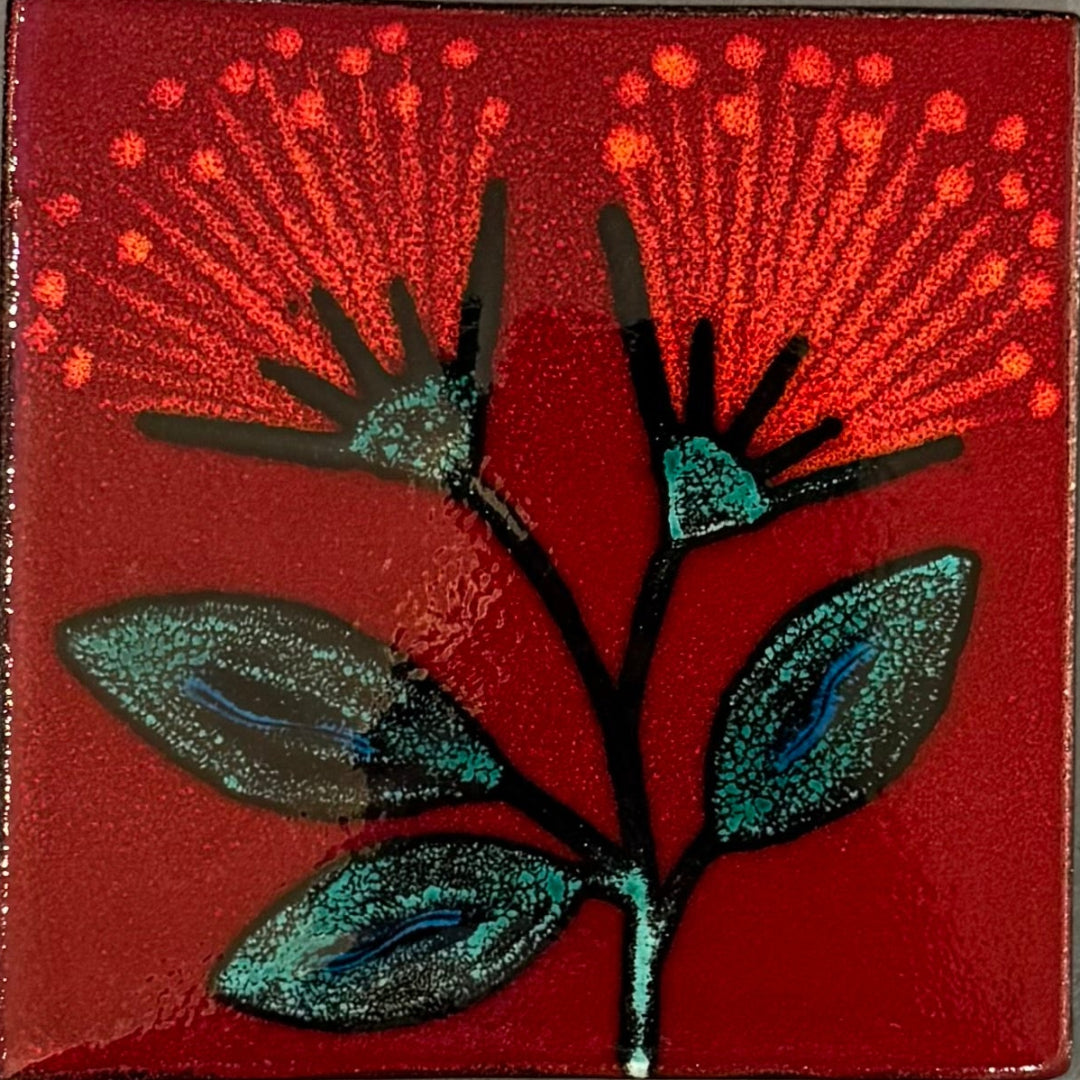 Square red tile with pohutakawa fower design