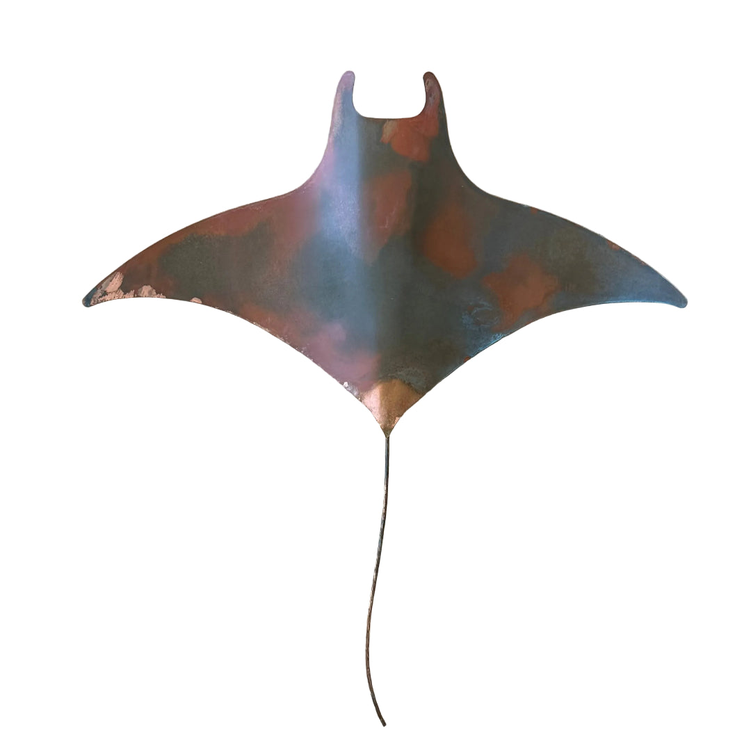 Decorative copper manta ray wall sculpture on a white background