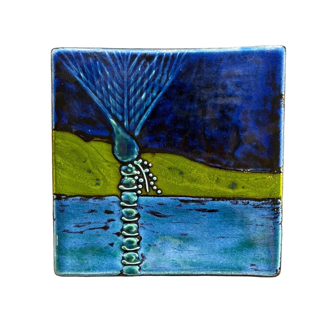 Square ceramic tile with blue and green coastal Nikau Palm on a white background