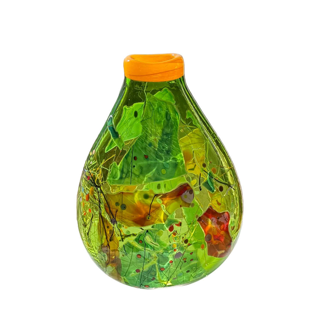 Decorative glass vase with a colorful design on a white surface