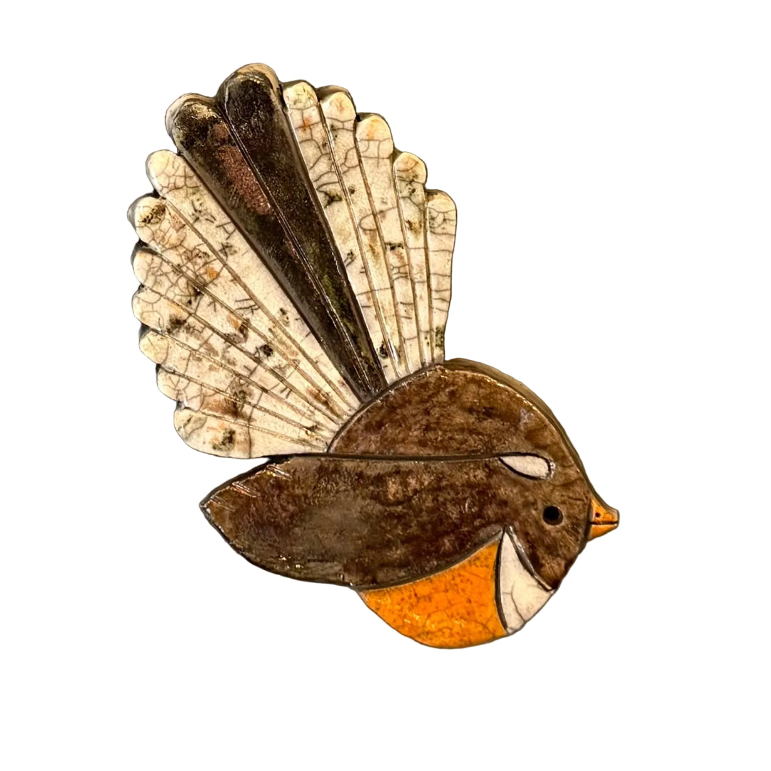 Ceramic Fantail shaped wall tile on a white background