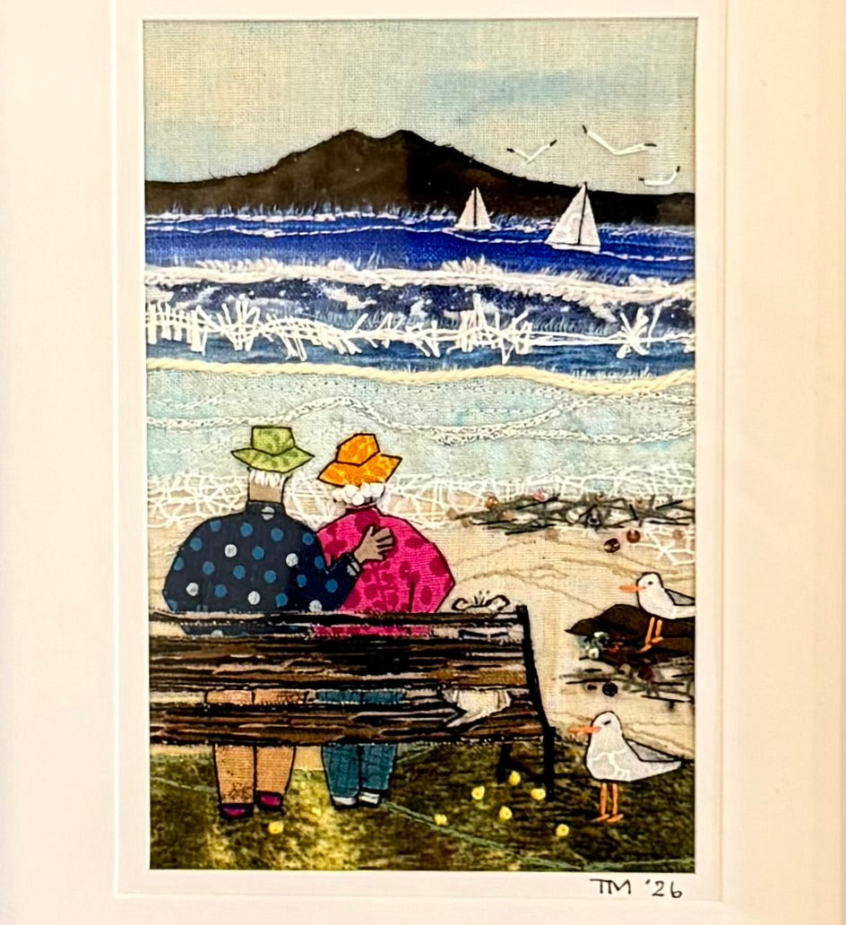 Artistic depiction of two people on a dock by the sea with sailboats and seagulls.