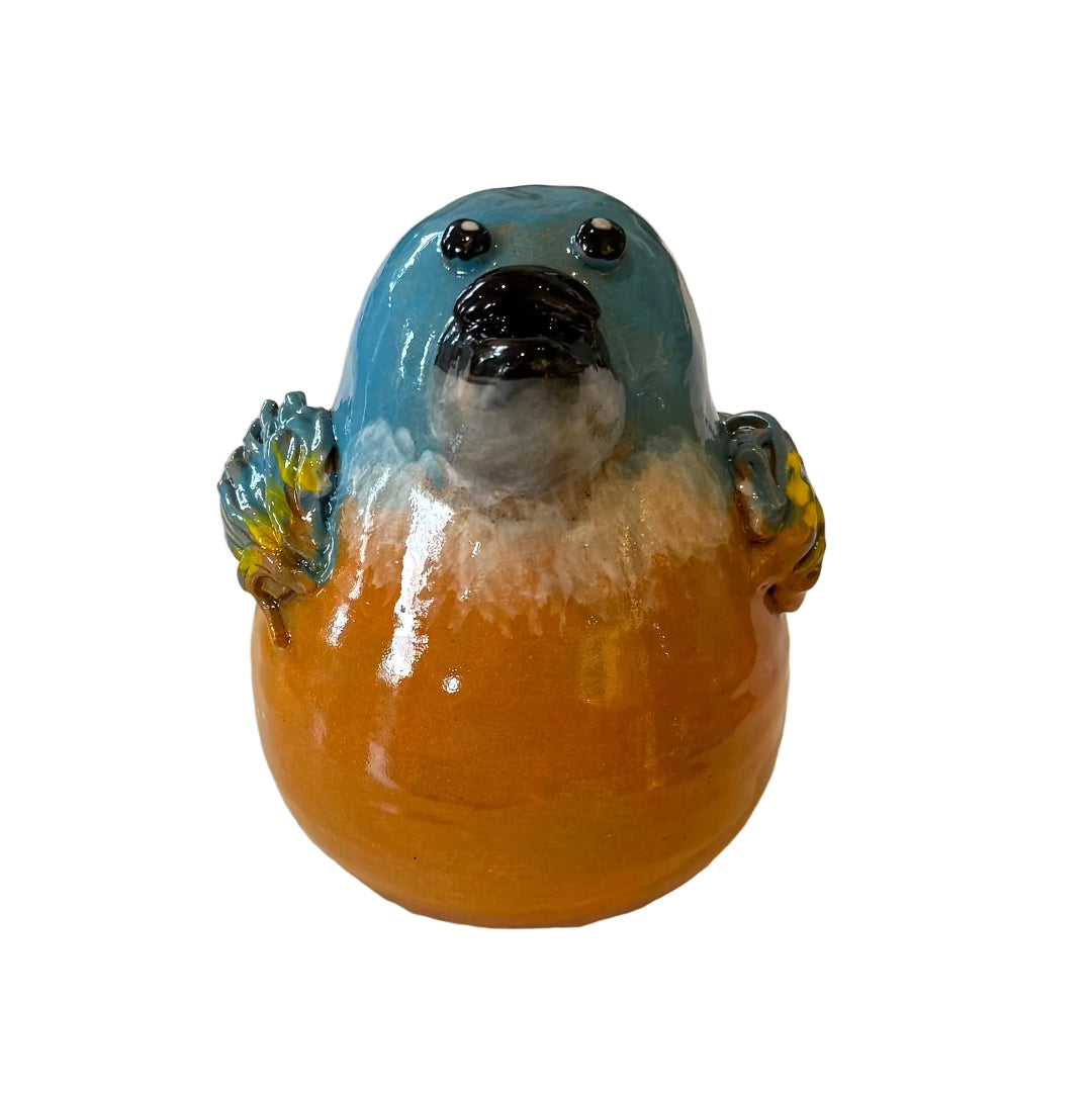 Ceramic Kingfisher bird sculpture with a black beak on a white background