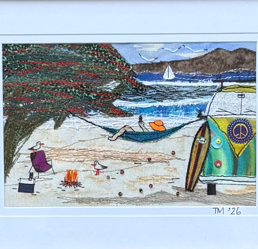 A colourful beach scene textile artwork with a hammock, beach tent, sailboat, trees, and a small campfire, presented on a white background.