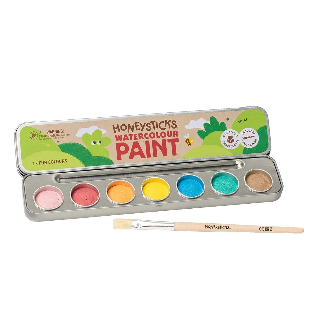 Honeysticks watercolour paint set with six paint pots and a brush on a white background