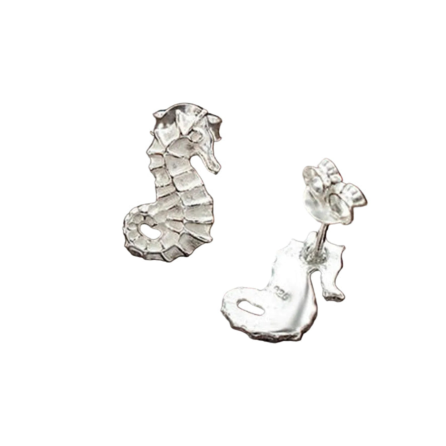 Silver seahorse earrings on a white background
