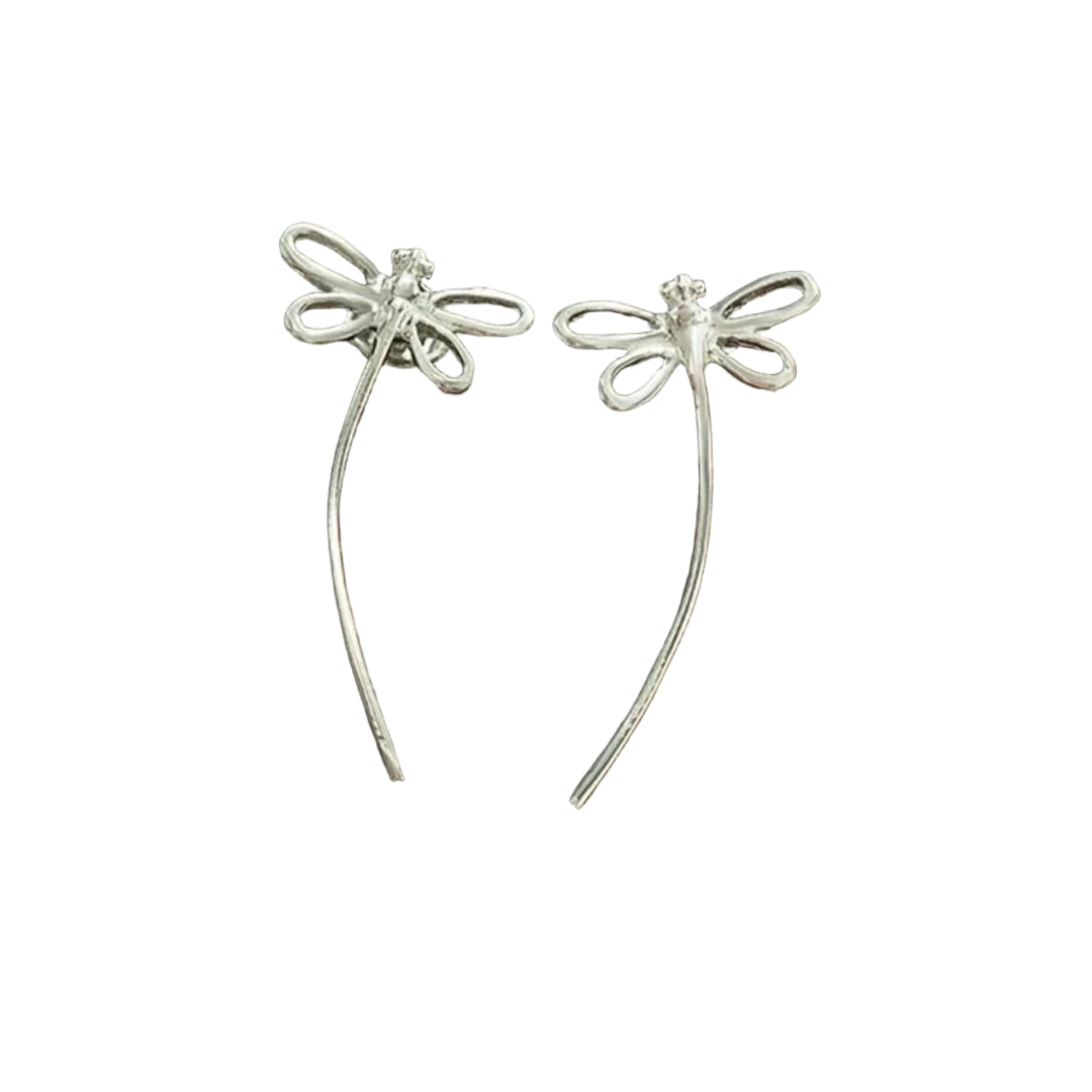 Pair of silver dragonfly earrings on a white background