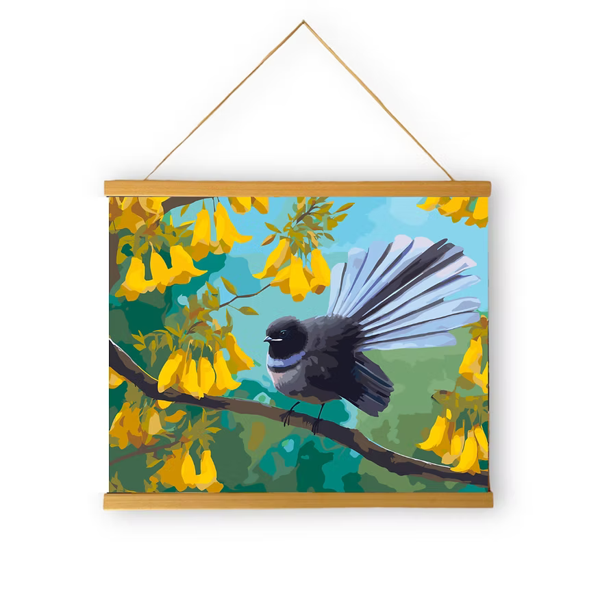 Framed artwork of a bird on a branch with yellow flowers