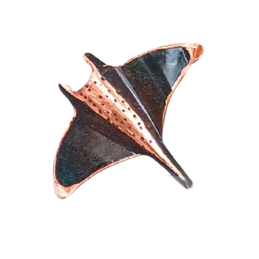 Copper and black wall manta ray on a white background
