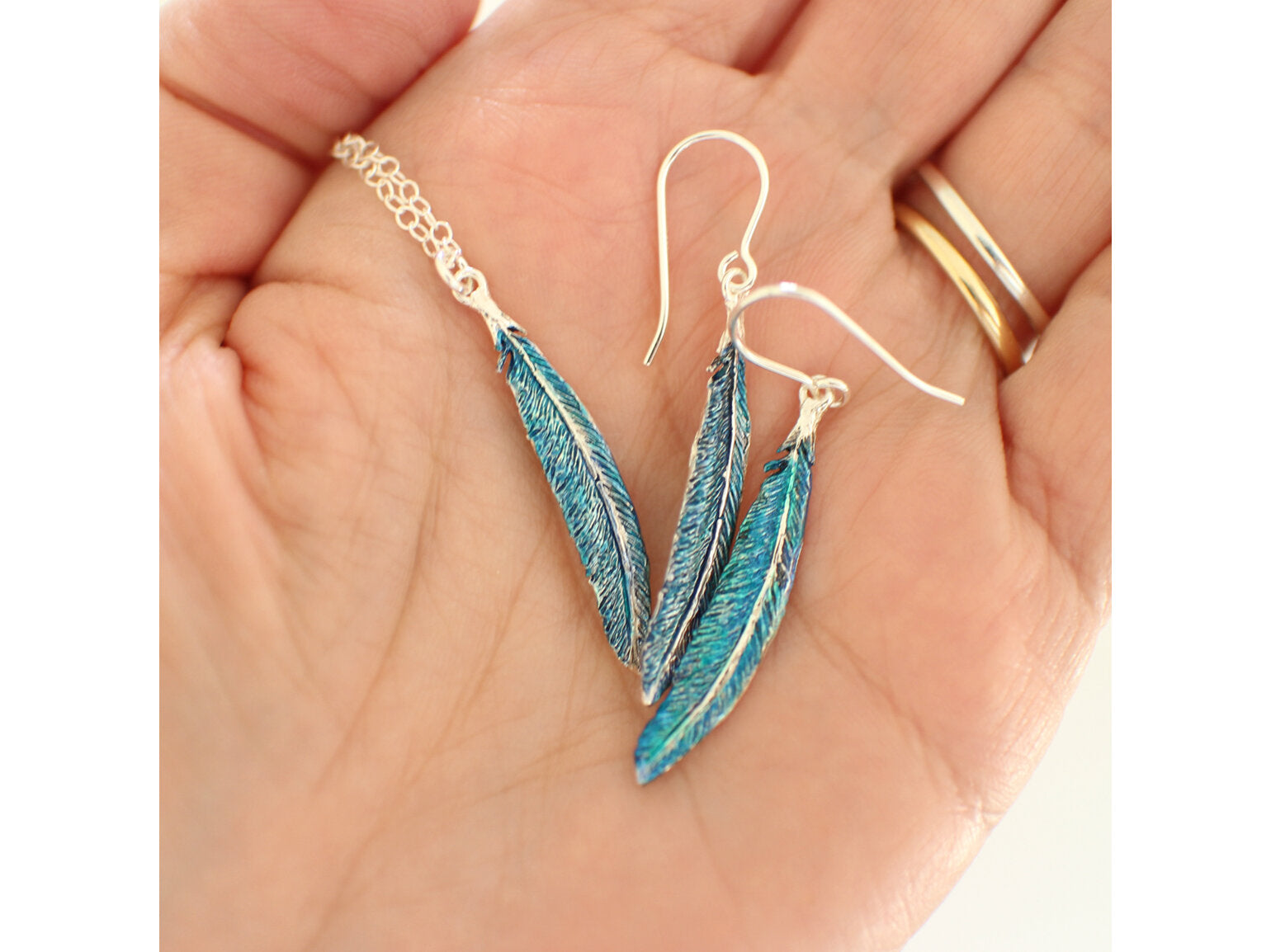Tui Feather Earrings