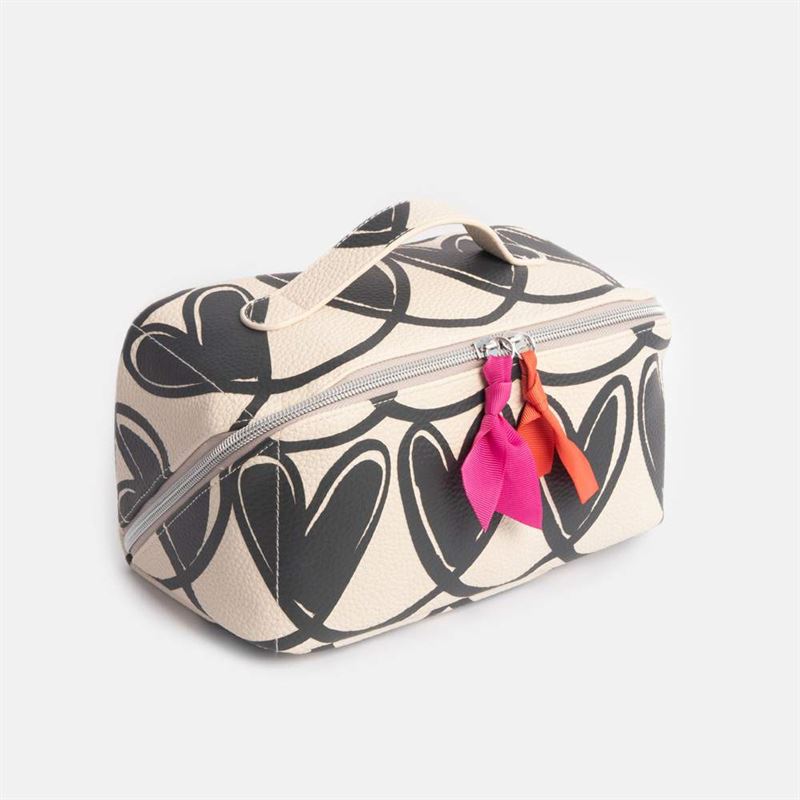 Cosmetic bag with black heart pattern and colorful tassels on a white background