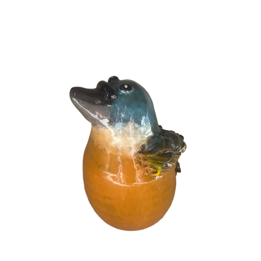 Ceramic Kingfisher bird sculpture with a black beak on a white background