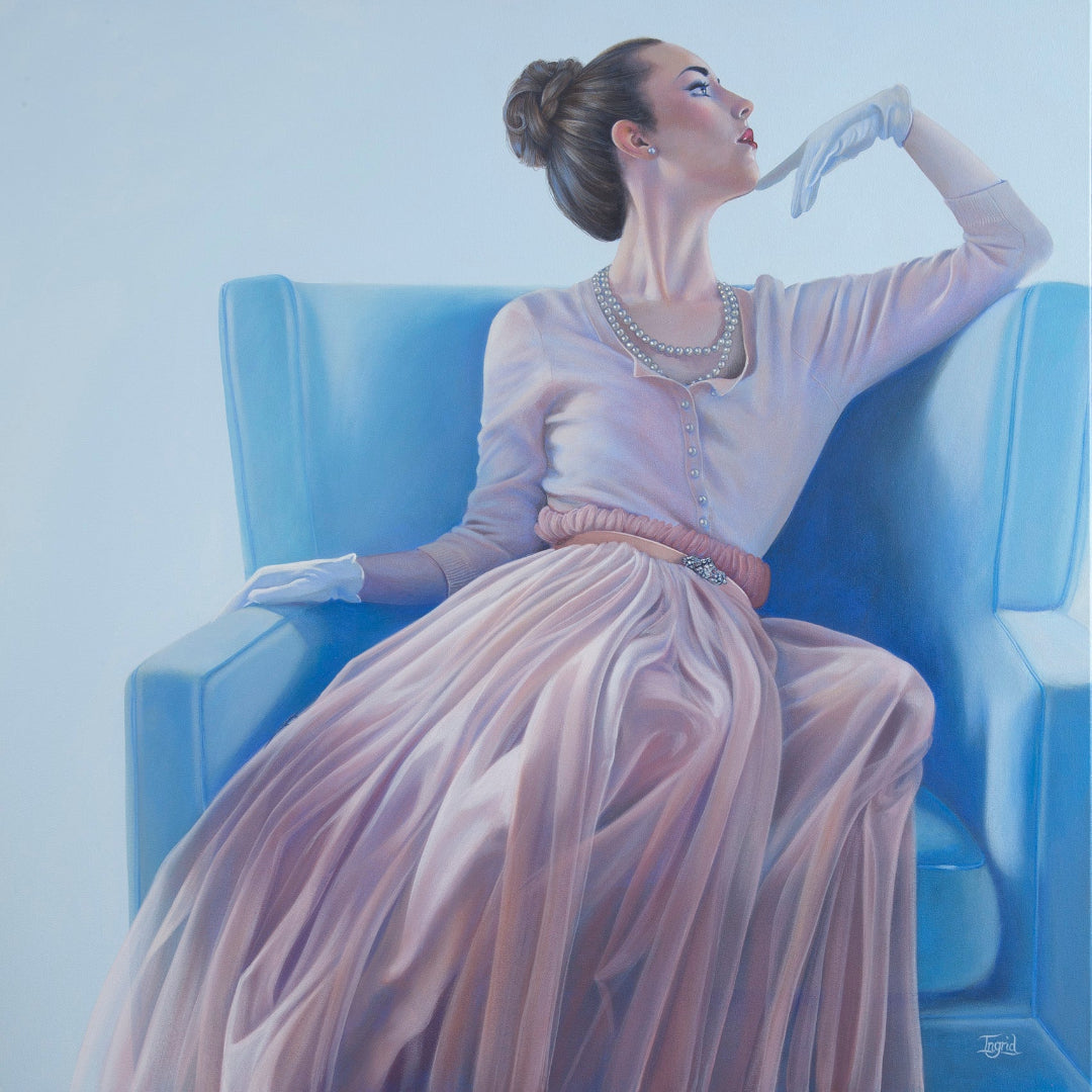 Woman in a vintage-style dress sitting on a blue chair with a soft, pastel color palette.