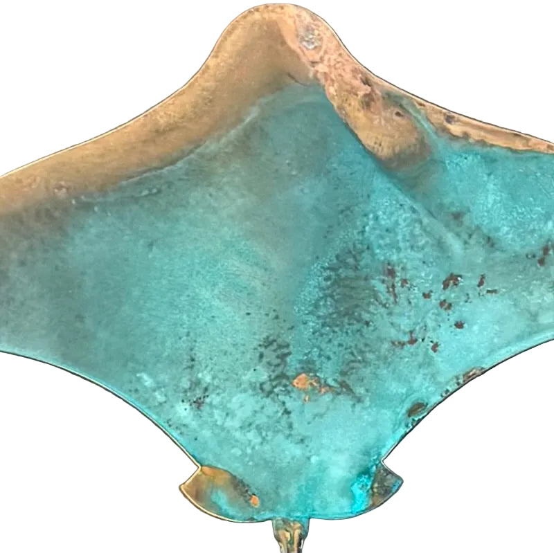 close us of an aqua blue copper stingray sculpture
