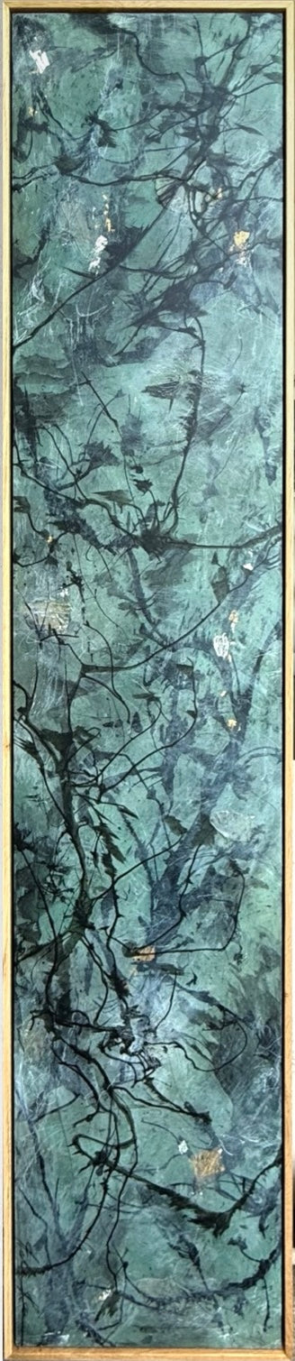 A rectangular art print or panel featuring an abstract marbled pattern in shades of teal, green, and black, framed by a thin gold-toned border.