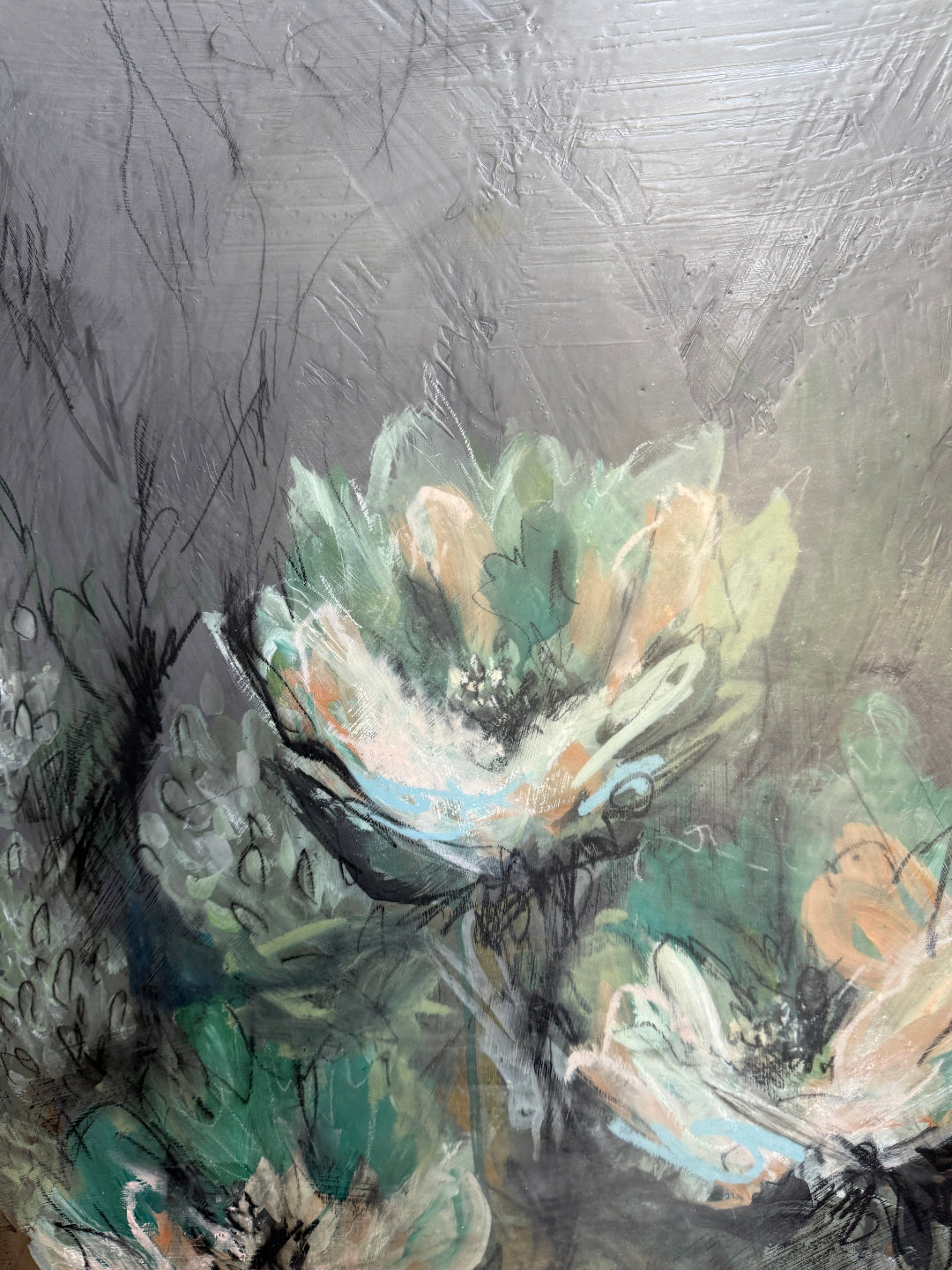 Abstract painting with floral elements on a textured gray background