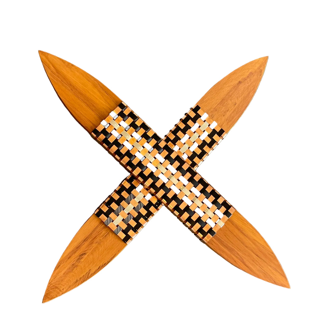 Wooden decorative item with a checkered pattern in the center on a white surface