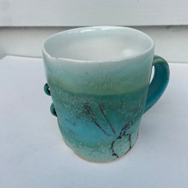 Turquoise and White Cup with 2 Staples