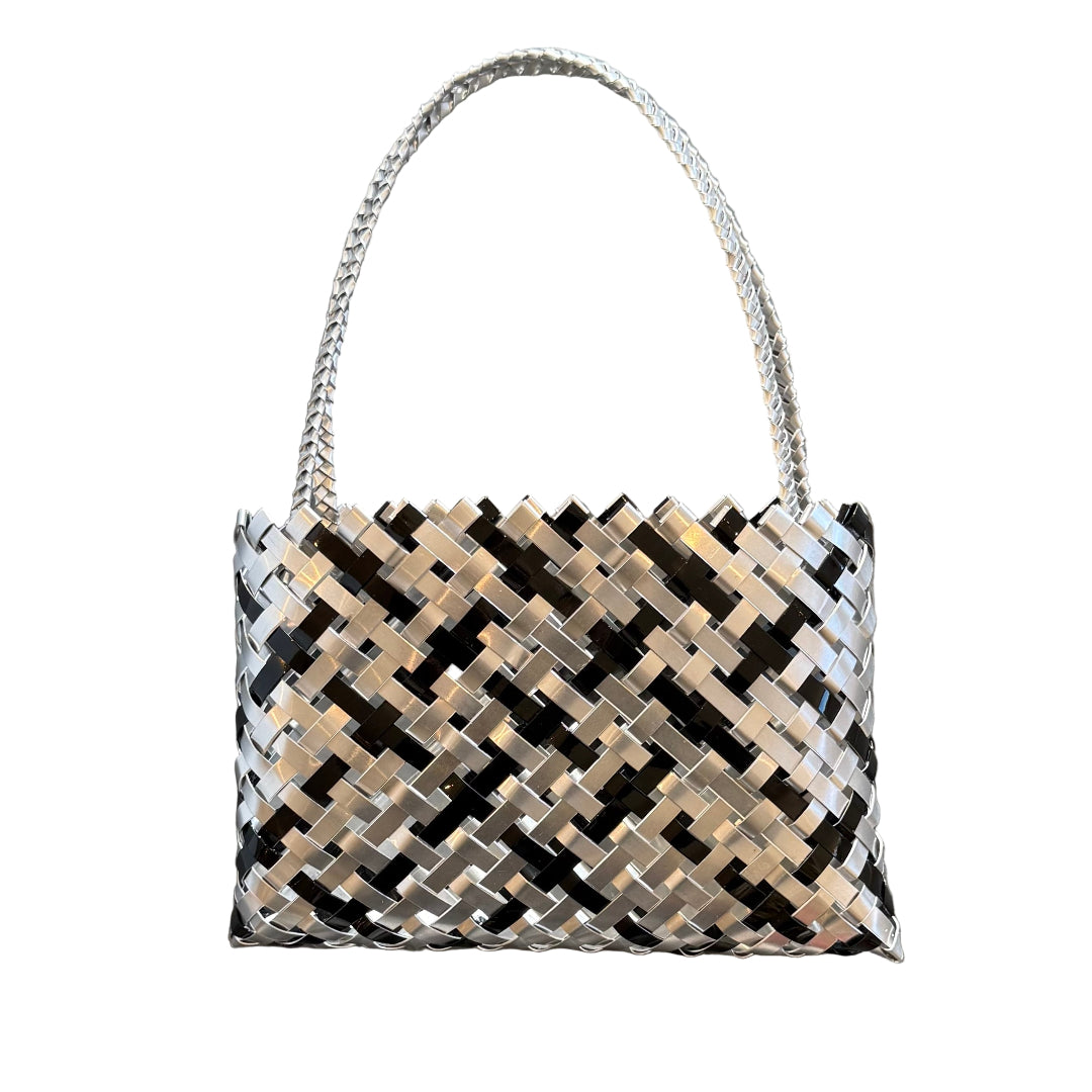 Kete handbag woven with black and silver aluminium on a white background