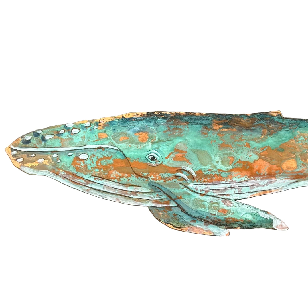 Decorative copper whale sculpture with copper and green patina on a white background