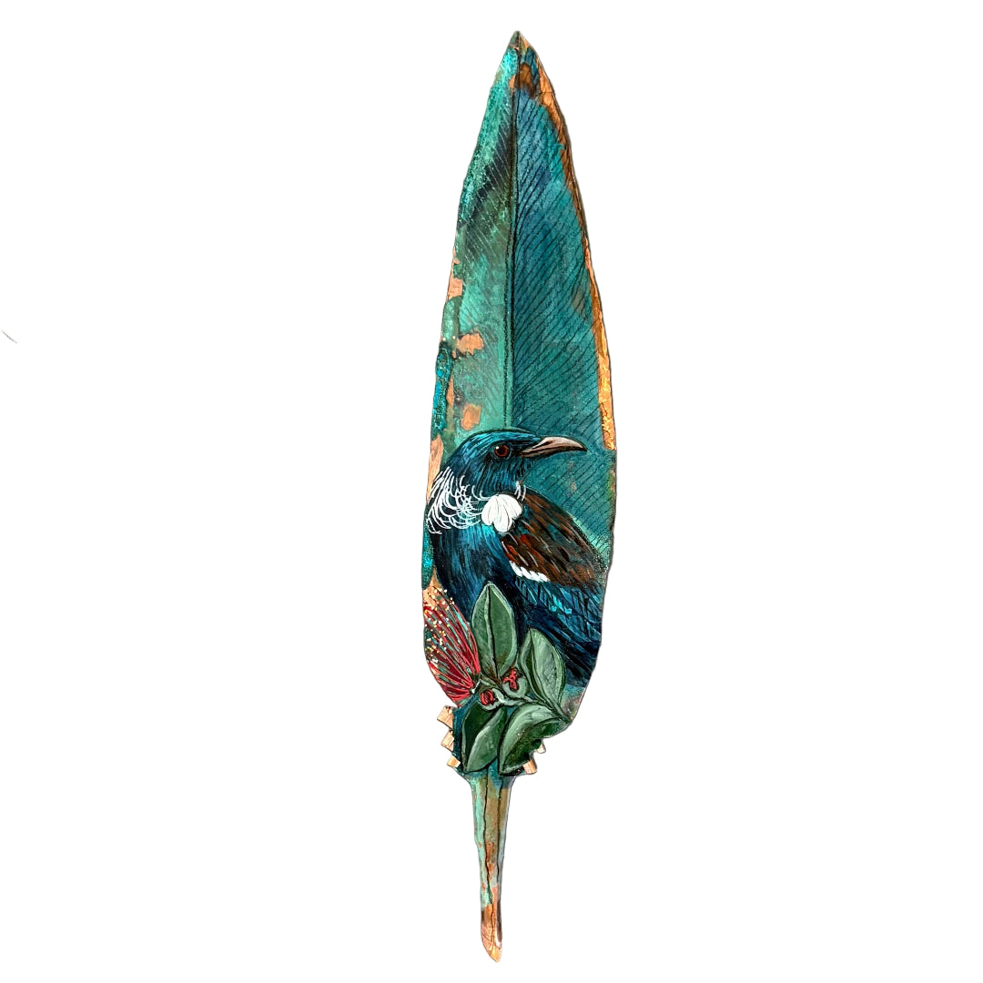 Decorative copper feather with a painted Tui bird on a white background