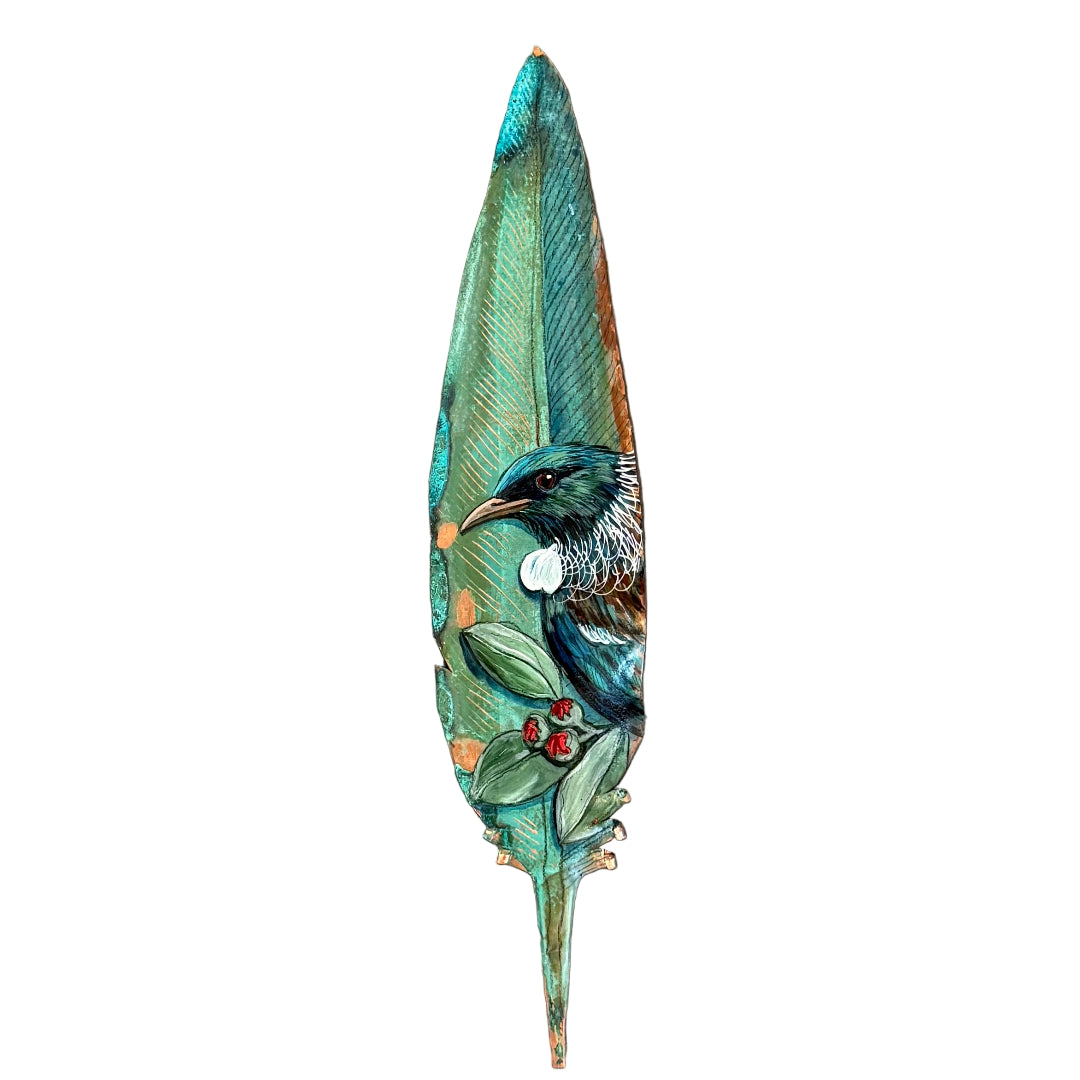 Decorative copper feather with a painted Tui bird on a white background