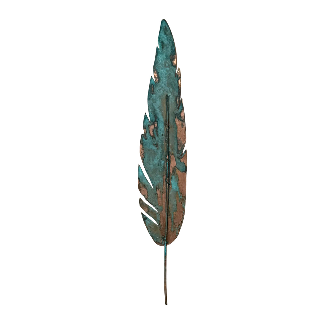 Decorative copper wall feather on a white background