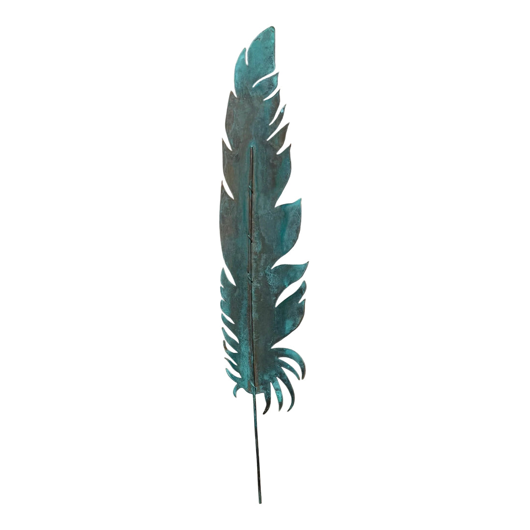 Decorative copper quill feather wall art on a white background