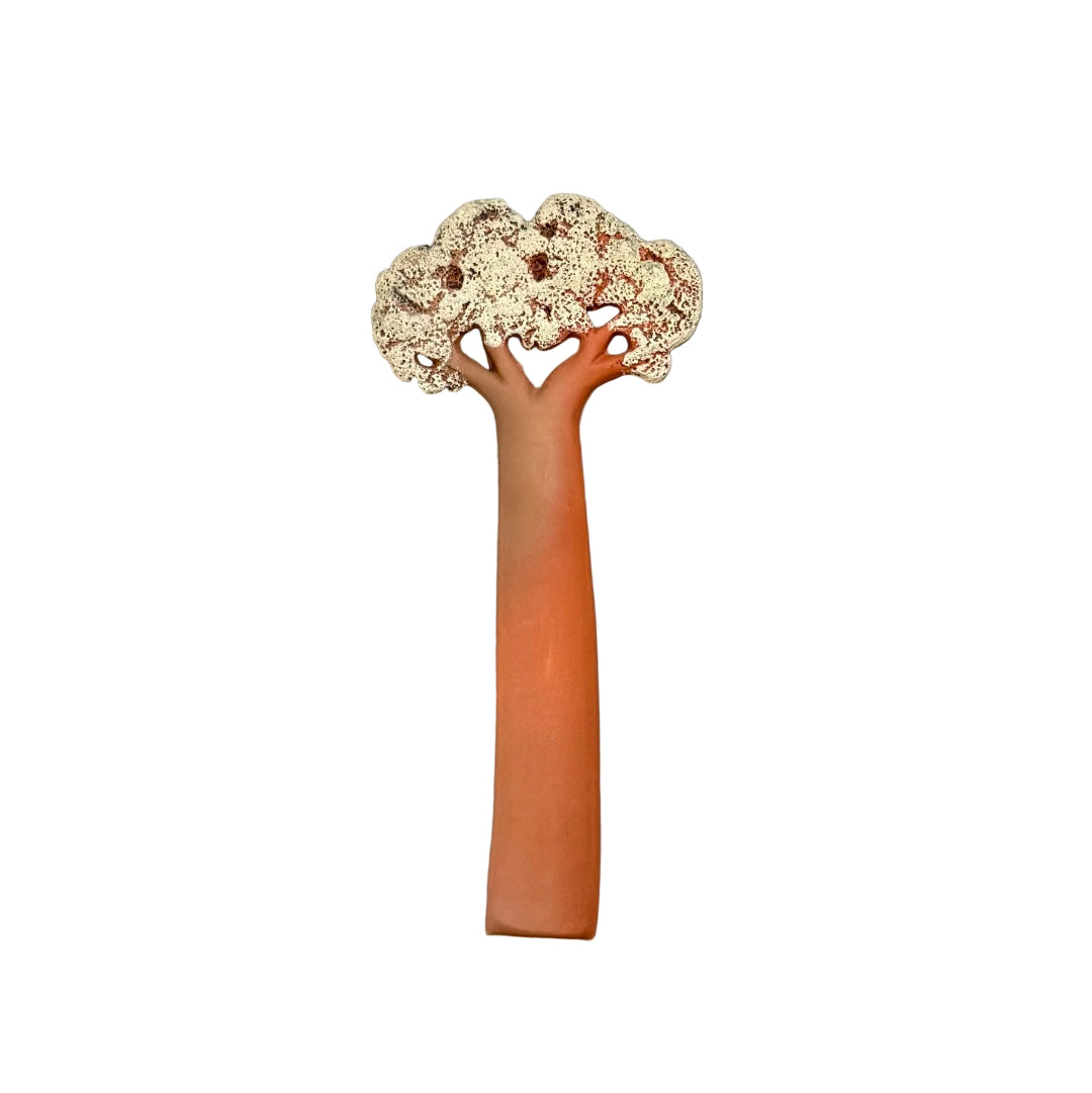 A handcrafted terracotta kauri 
tree sculpture with a glaze finish, featuring multiple leaf-like elements, with a hook on the back for hanging.