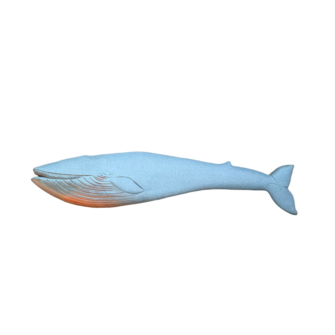 Terracotta Blue whale wall art on a white background