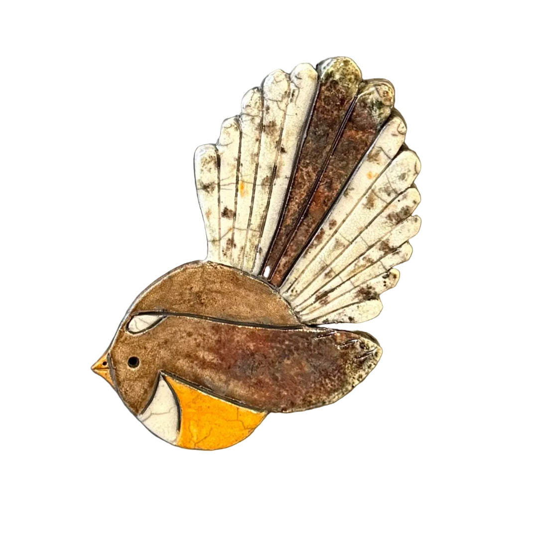 Ceramic Fantail shaped wall tile on a white background