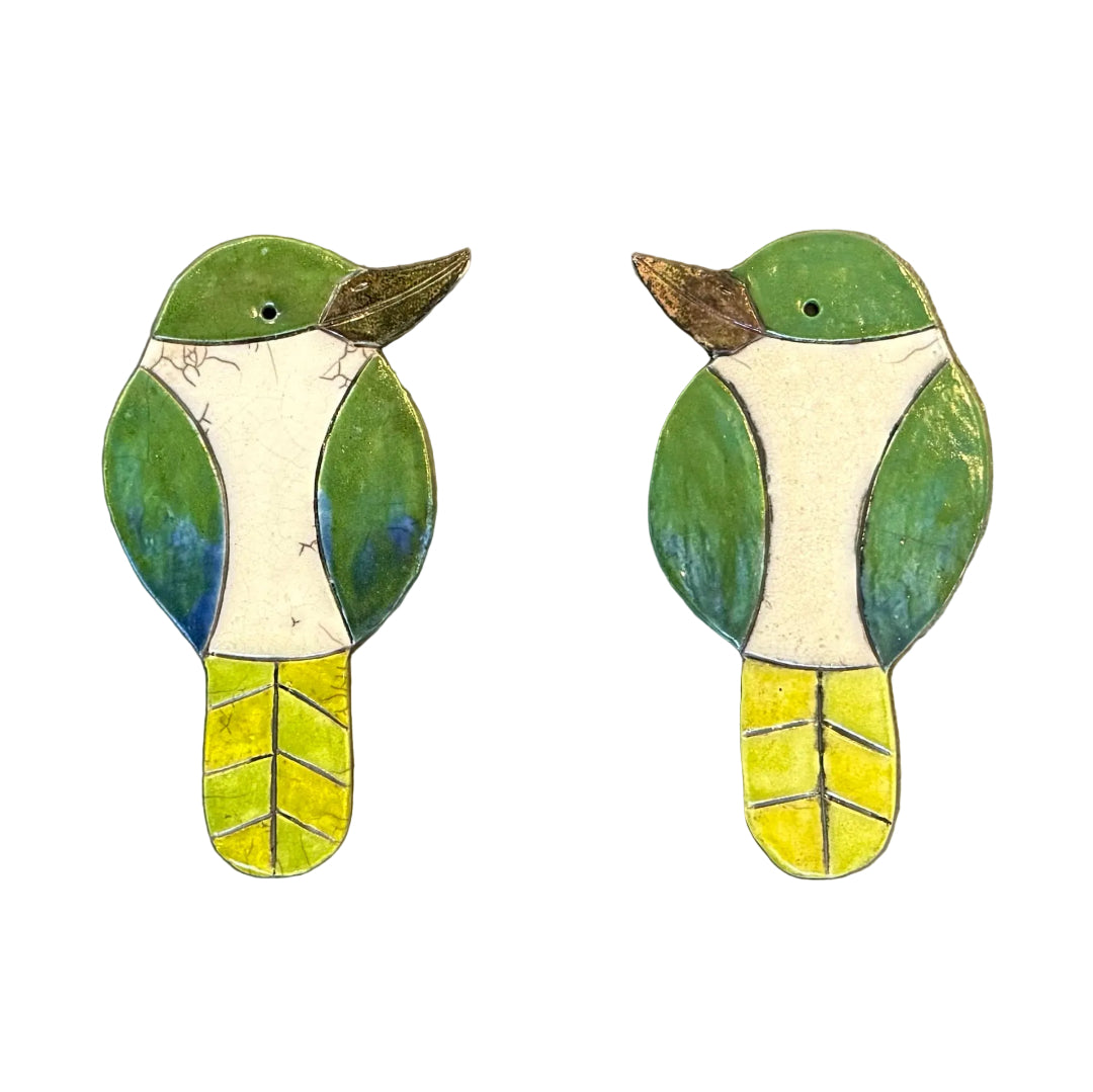 Two colourful ceramic Kingfisher shaped wall tiles on a white background