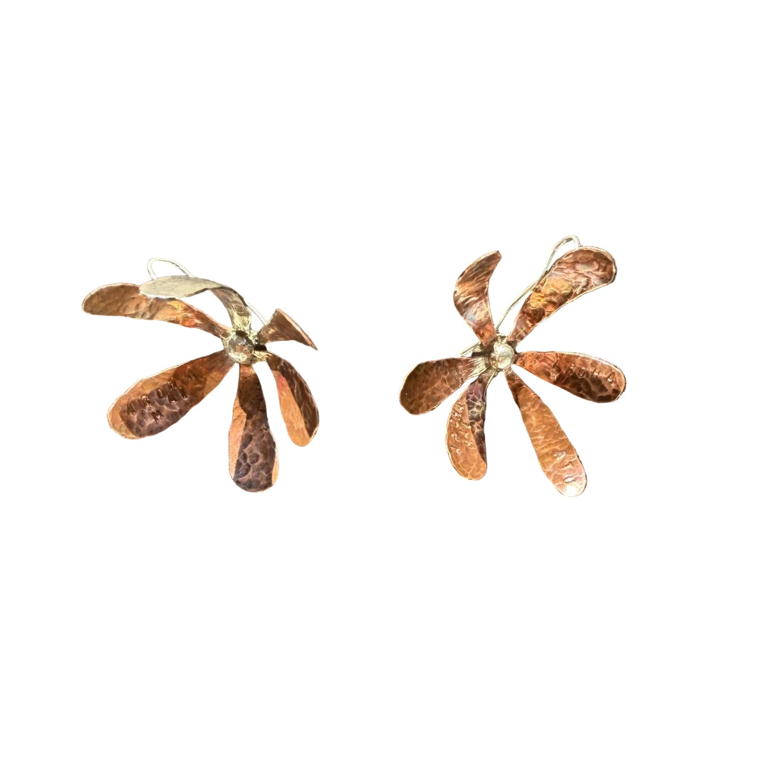 Pair of copper & silver flower-shaped hook earrings on a white background.