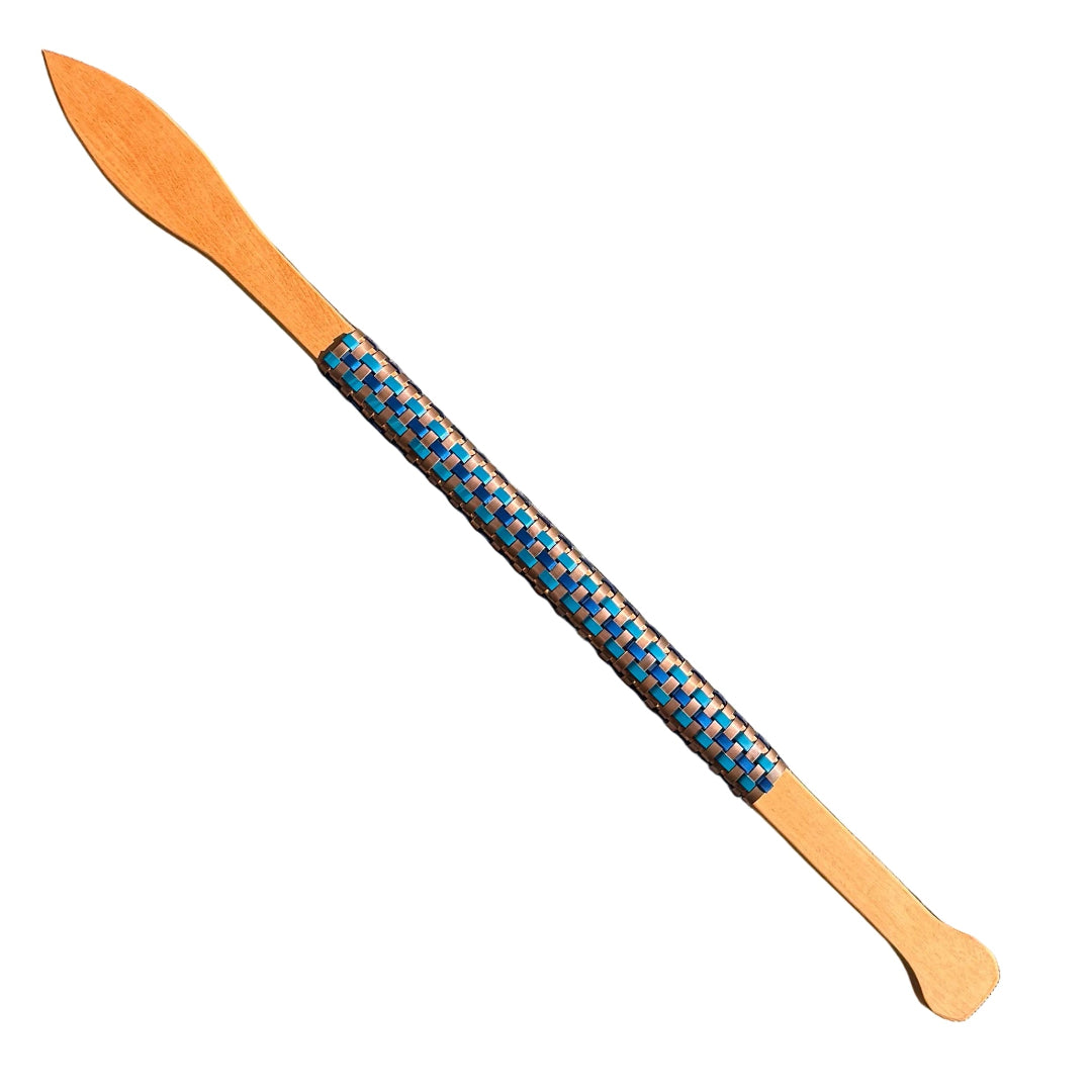 Wooden weapon or Taiha with a pointed end and woven aluminium handle on a white background