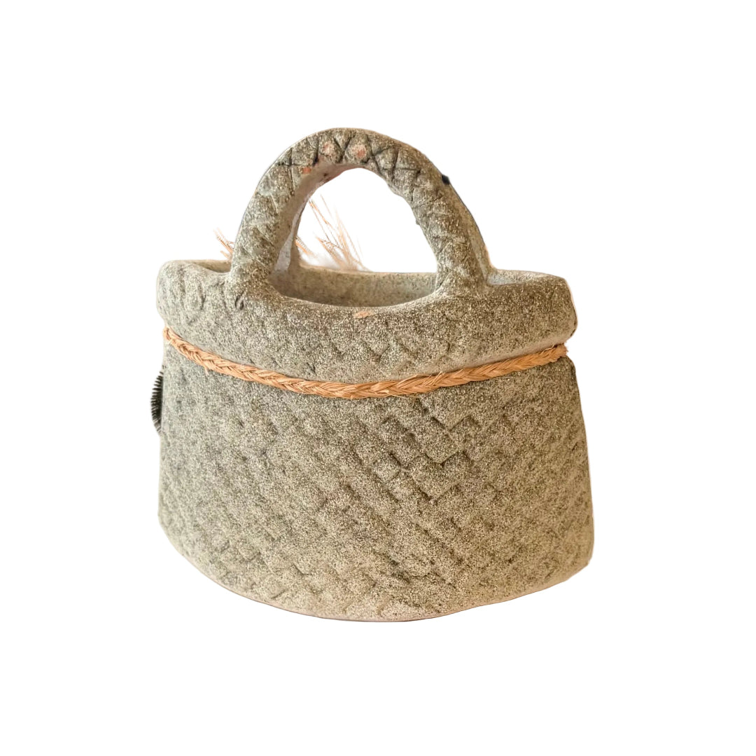 Back view of a terracotta basket or kete 