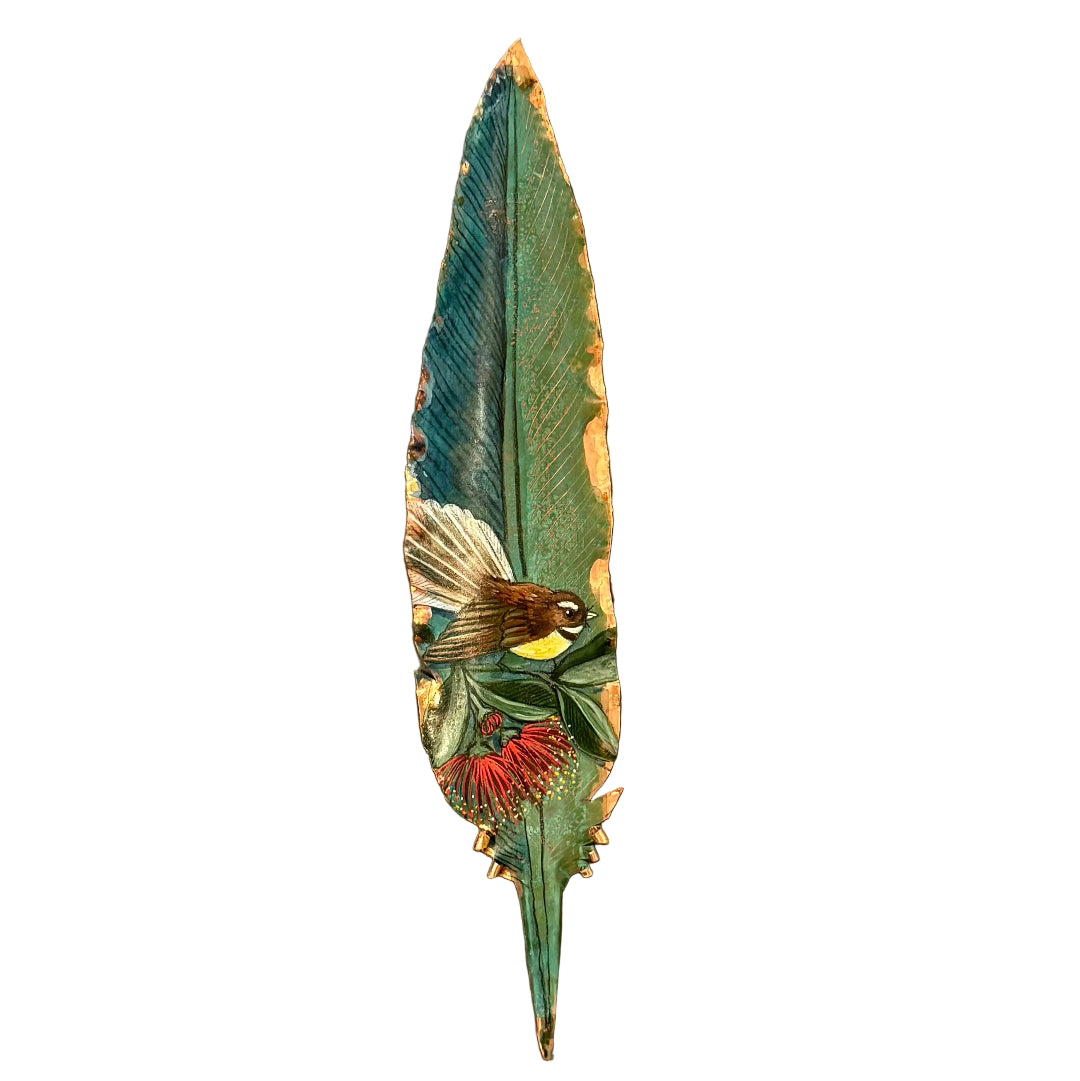 Painted  copper feather with a fantail bird and  pohutakawa flower  on a white background