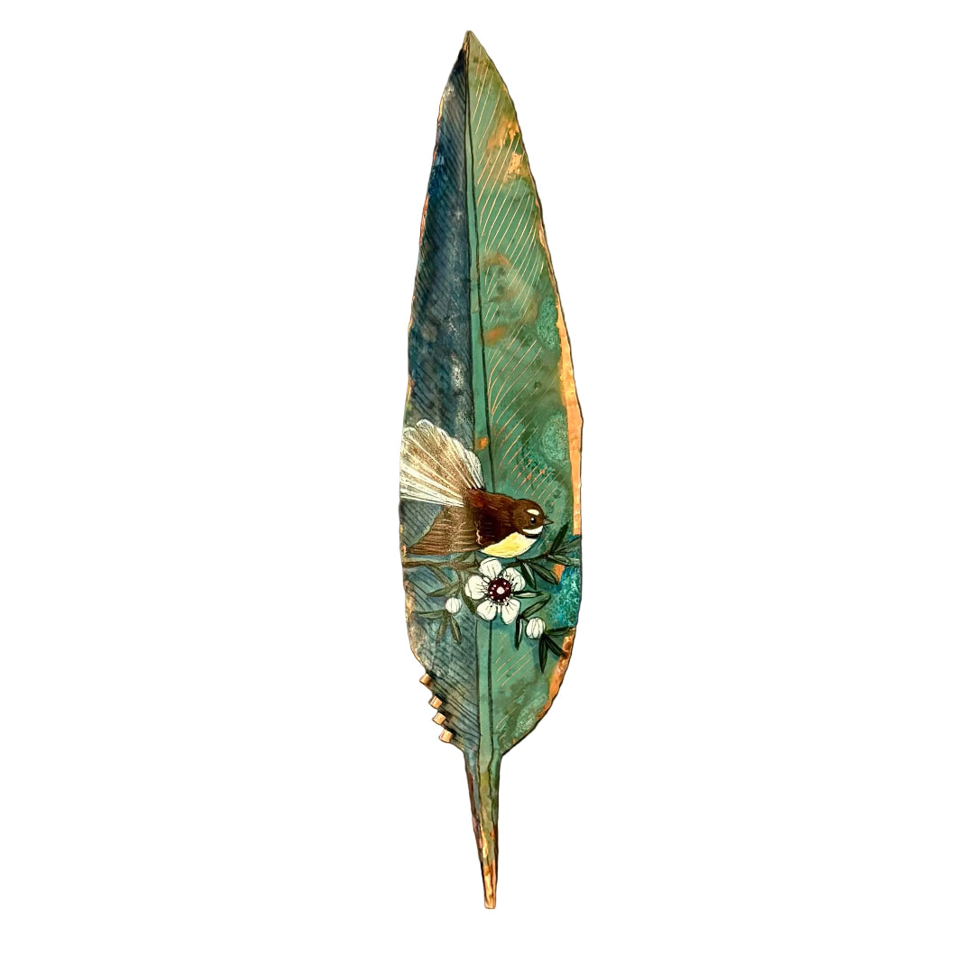 Painted  copper feather with a fantail bird and flower  on a white background