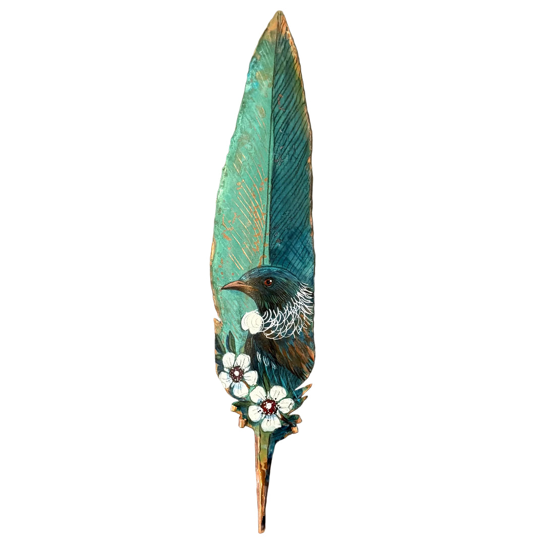 Decorative copper feather with a painted Tui bird and white flowers on a white background