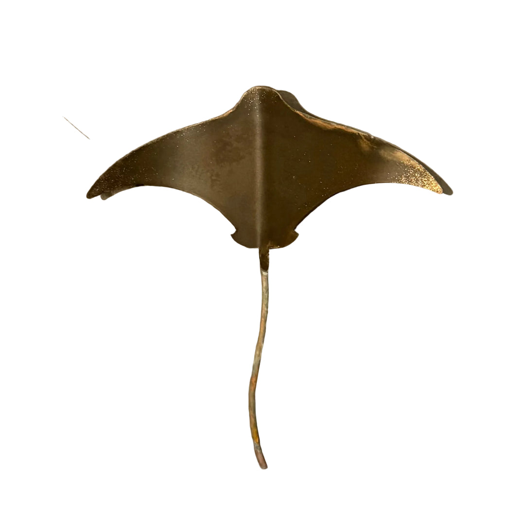 Copper stingray wall sculpture on a white background