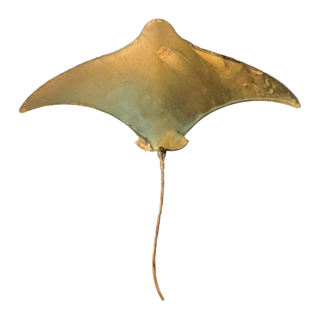 Copper stingray wall sculpture on a white background