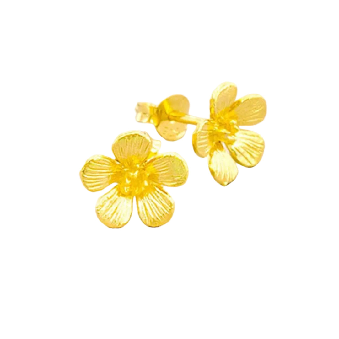 Pair of gold flower-shaped earrings on a white background
