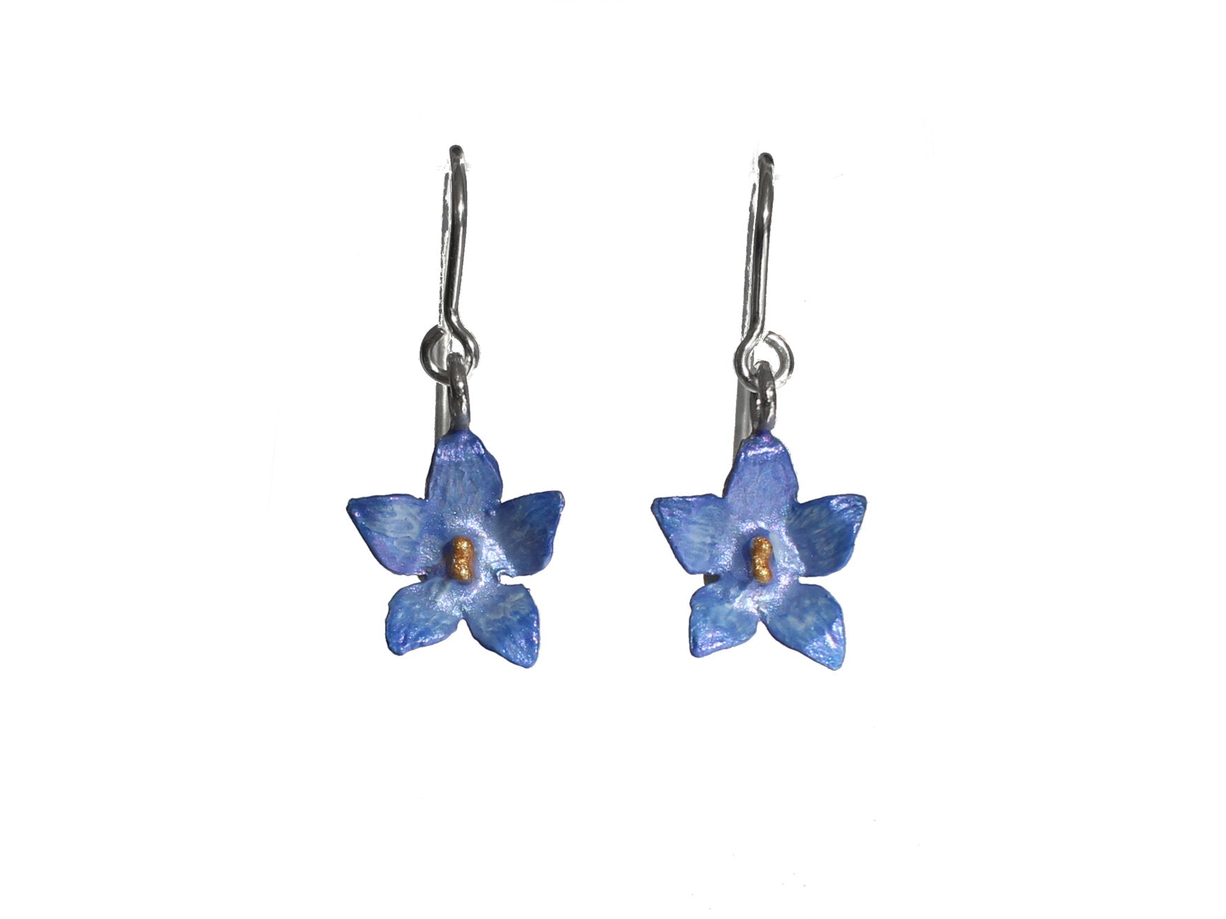 Pair of blue flower-shaped earrings on a white background